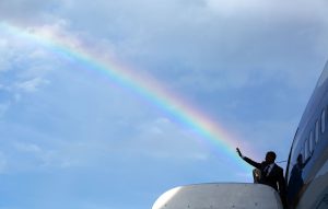The story behind President Obama Waving A Rainbow in Jamaica